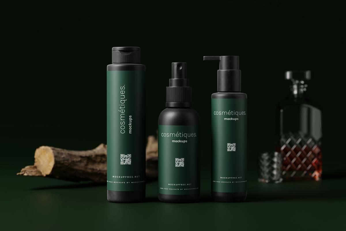 Close-up of hands pouring water onto a small potted eucalyptus plant.